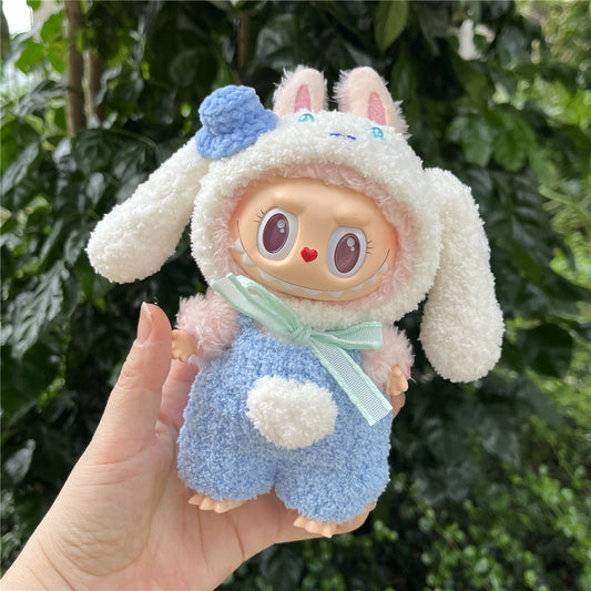 Labubu doll dressed in a handmade Cinnamoroll outfit with white fleece and floppy puppy ears